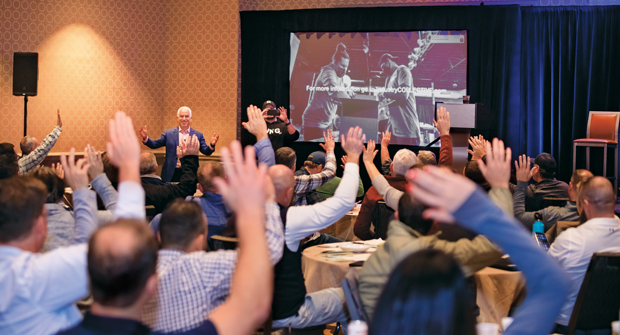 Jeffrey Scott (left), welcomes attendees to his retreat in New Orleans. Scott was joined by several speakers, including Mike Haynes (right), founder of The Loving Cos. (Photo: Jeffrey Scott)