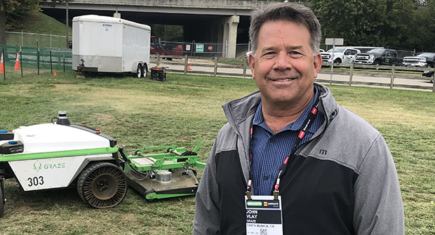 Graze CEO John Vlay shows off his company's new line of robotic mowers, which he hopes to release for sale later this year. (LM Staff)