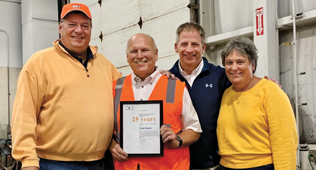 For Sperber Landscape Co. it’s about the people. Chris Kujawa, president of KEI; Todd Haslier, manager and training coordinator; Tom Jurasinski, director of operations and Judy Kujawa, office manager; recognize Haslier for 25 years with KEI. Sperber added KEI in 2019. (Photo: Sperber Landscape Co.) 
