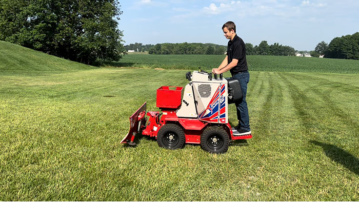 Attendees also got a chance to demo Ventrac tractors, attachments and snow vehicles. Here, Caleb Martin, sales manager with Creation Landscaping and Lawn Care in Lancaster, Pa., takes Ventrac’s SSV, stand-on sidewalk snow vehicle, for a spin. (Photo: LM Staff)