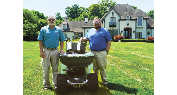 Bradley and Tyler Kesecker of Emerald Island Lawn Service say the company’s PermaGreen spreader-sprayers cut application times in half. (Photo: Emerald Island Lawn Service)