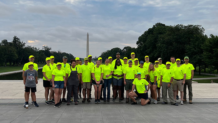Volunteers from John Deere before the start of work during NALP's Renewal and Remembrance. (Photo: LM Staff)
