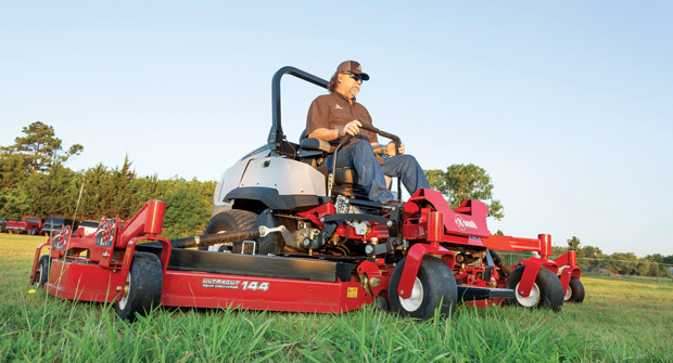Frank Maxey, fleet manager for Earthworks, says this Exmark 144-inch mower speeds up mowing times on a big commercial property from a day and a half to half a day. (Photo: Danny Hurley)