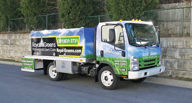 Jesse Smith, owner and president of Royal Greens, a Maryland-based lawn care company, says the company’s Isuzu trucks save the operation money on maintenance. (Photo: Royal Greens)