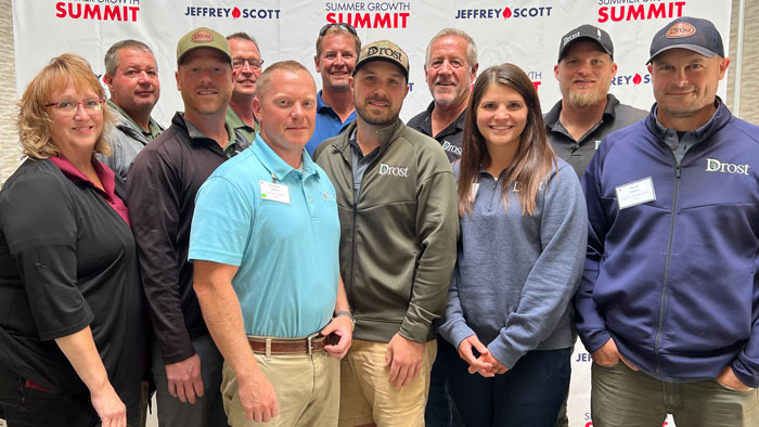 Drost team members (back from left) Jim VanAnterwerp, Dale Drier, Jake Bock, Bob Drost, Jason Porkka (front from left) Darlene Matelski, Brent Ward, Jason Zulski, Jenna Lindenberg and David Grossi. (Photo: LM Staff)