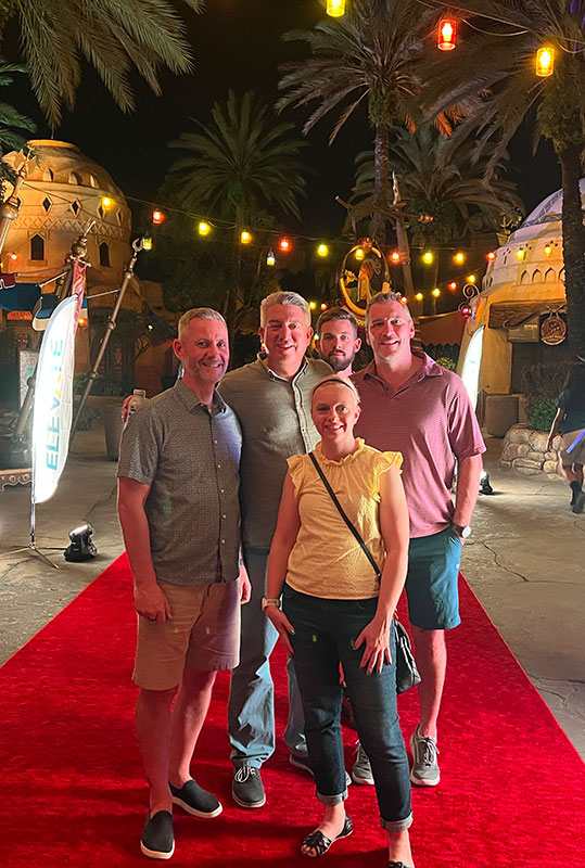 The LM Team including Publisher Bill Roddy, Editor-in-Chief Seth Jones, Associate Publisher Craig MacGregor and Editor Christina Herrick hit the red carpet at Universal Studios' Island of Adventure. The LM staff couldn't escape a photobomb from Corey Peterson, branch manager at Pacific Landscape Management (back). (Photo: LM Staff)