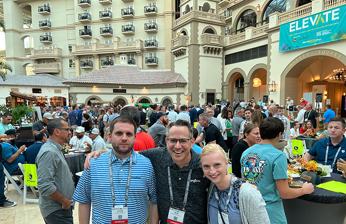 It was a packed house for the National Association of Landscape Professionals' opening reception at Elevate. Here, Syngenta's Carson Cashwell and Mark LaFleur catch up with LM Editor Christina Herrick. (Photo: LM Staff)