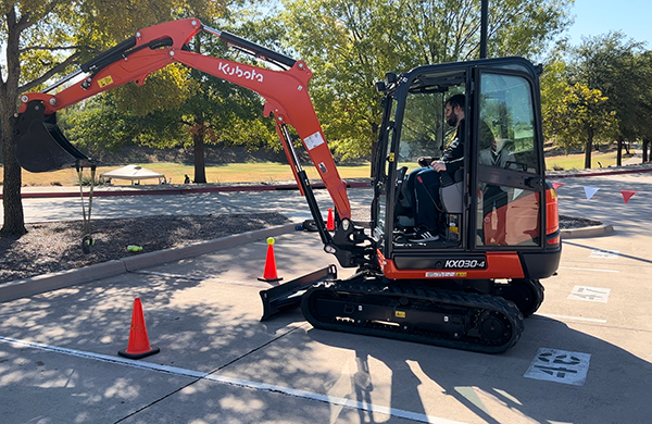 LM Associate Editor Rob DiFranco tests Kubota's KX030-4 compact excavator at the Kubota Connect event in Grapevine, Texas. (Photo: LM Staff)