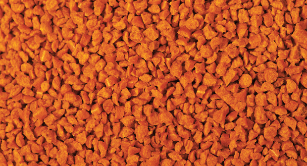 Rob Elder, owner of Omaha (Neb.) Organics sells corn gluten, made of pressed corn, as a natural preemergent herbicide. (Photo: Omaha Organics)