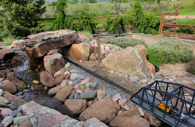 One of the more challenging aspects of the railroad installation was a waterfall designed by Alpine Gardens, according to Fetig. (Photo: Alpine Gardens)