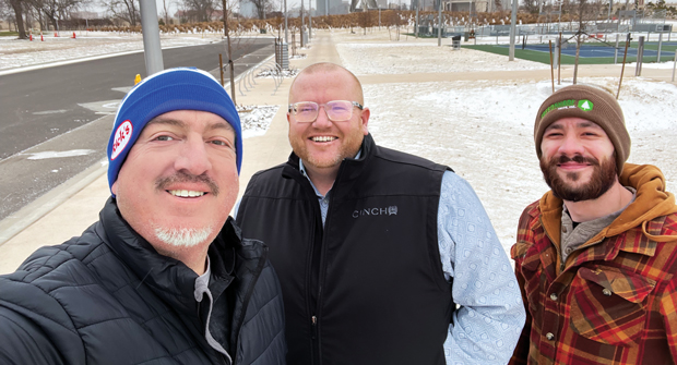 Jones braved the elements for this selfie with GreenShade Trees’ Justin Lingo (center) and Tyler Entz (right). (Photo: LM Staff)