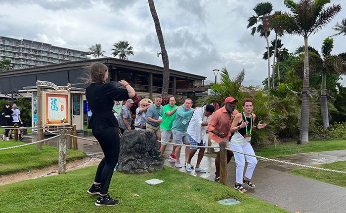As part of the Team-Opoly group event, teams acted out several challenges, including this video challenge where the group depicted a train in motion. (Photo: LM staff)