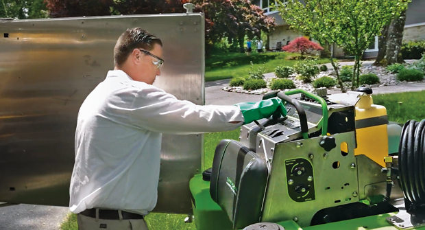 Green Lawn Fertilizing’s QA team evaluates the performance of services provided. (Photo: Green Lawn Fertilizing)