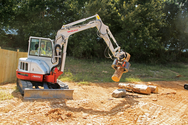 Tiltrotators bring a new element to machines such as compact excavators, allowing for added versatility and control, experts say. (Photo: Takeuchi)