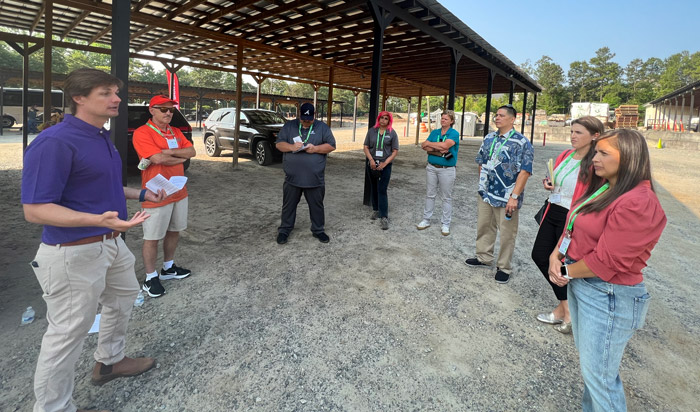 Russell Landscape CEO Teddy Russell (left) shares his insights on leadership during a stop at his company's Sugar Hill, Ga., headquarters. (Photo: LM staff)