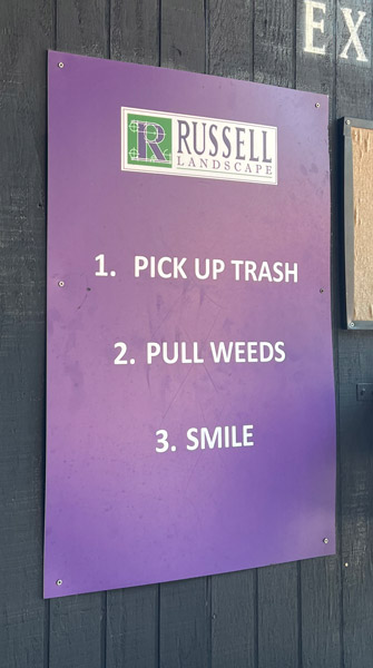One of Russell Landscape CEO Teddy Russell's sayings is found on signs throughout the company's Sugar Hill, Ga., headquarters. (Photo: LM staff)