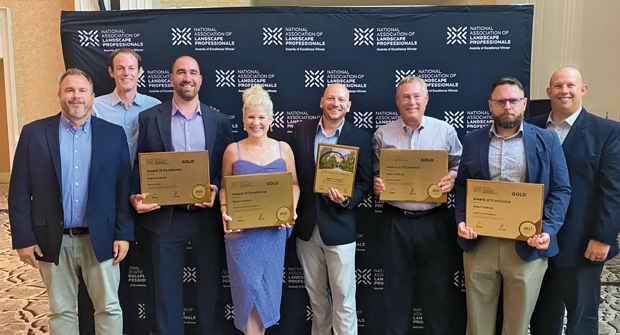 Amy Snyder, director of public relations with Ruppert Landscape (center), says she enjoys NALP’s award ceremony and pays close attention to any new innovations she could deploy at her operation for Ruppert events. (Photo: Ruppert Landscape)