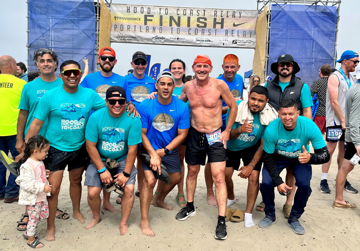 Pacific Landscape Management's “Lawn Gone and Hauling Grass” Team 2 at the finish line. (Photo: Pacific