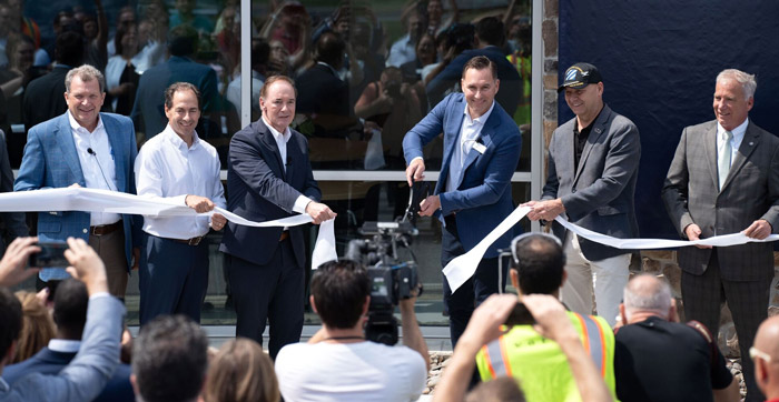 Officials including Tim Watters of Hoffman Equipment, U.S. Rep. John Joyce, and Volvo CE Acting President Scott Young cut the ribbon to open the training center. (Photo: Volvo)
