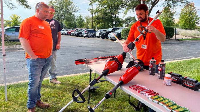 Mark Taylor (right), product manager at Echo shows off the companies newest edgers to Michael Bedell and Scott Horoszewsk at a recent media event. (Photo: LM staff)