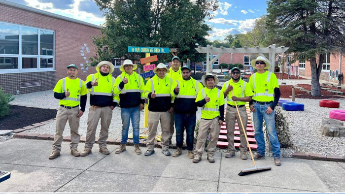 Team members from Grunder Landscaping Co. volunteered their time to refresh a local sensory garden. (Photo: Grunder Landscaping Co.)