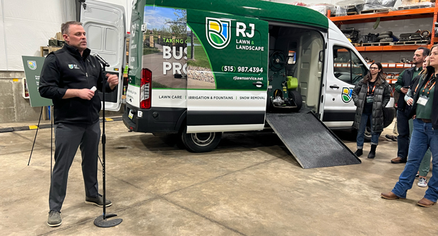 Ryan McCarthy spoke with attendees as they made their way along the tour of RJ Lawn & Landscape. (Photo: LM Staff)