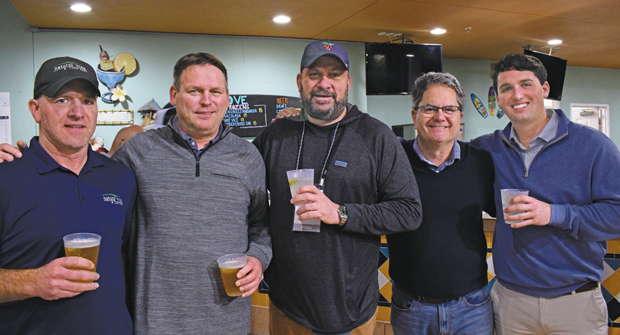 These guys are wicked smart: Everyone stood back as this group of New Englanders got going … what did they just say? From left to right are Lawrence Taylor, manager, Natural Tree and Lawn Care, Stoughton, Mass.; Michael Stephens, general manager, Always Green of Cape Cod; Chris Joyce, president, Always Green of Cape Cod, Marstons Mills, Mass; with Rob Fawcett, president and Michael Trask, business development associate, Tiger Payment Solutions, Kingston, Mass. (Photo: LM Staff)