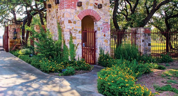 Home to a family-owned Italian restaurant, Texas live oaks surround this property. (Photo: Clean Scapes)