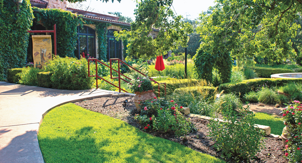 This area previously featured three Italian Cypress trees. Filling in the empty space left by the loss of these trees was a major priority for the contractor. (Photo: Clean Scapes)