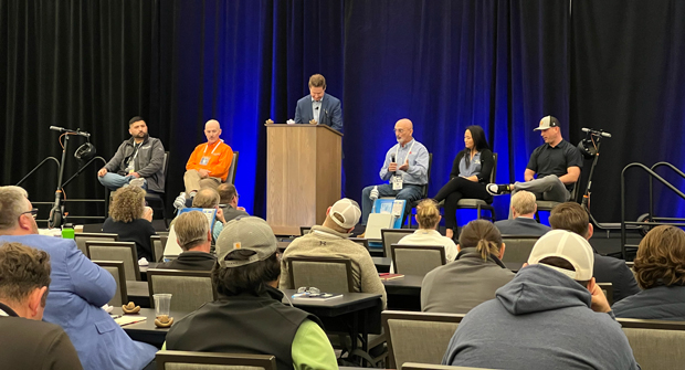 Jared Rice of Weathermatic (standing) moderated The SmartCon Q&A with Platinum Partners. Panelists included (from left to right) Niwar Nasim, Nasim Landscape; Bob Grover, Pacific Landscape; Mark Howell, Ideal Landscape; Michaela Rivas, Padilla Group; and Chase Cook, SMC Landcare. (Photo: LM Staff)