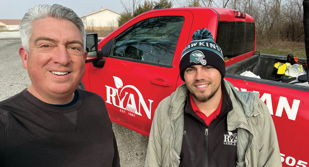 Me with my friendly lawn care operator, Boston Champagne. All of Boston’s customers appreciate him … even though he’s an Eagles fan. (Photo: LM Staff)