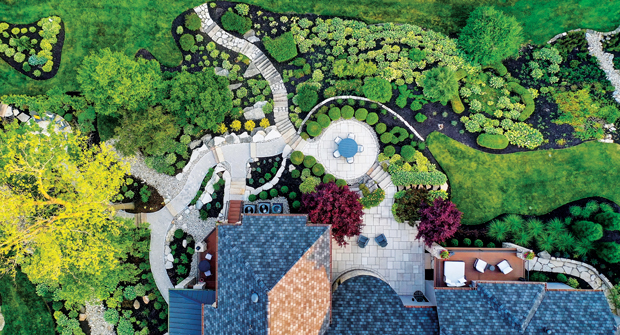 The homeowner spent several years incrementally replacing the deteriorating hardscapes and plants throughout the property before bringing in Landscapes by Terra. The contractor then rendered a master plan and got to work. (Photo: Landscapes by Terra)