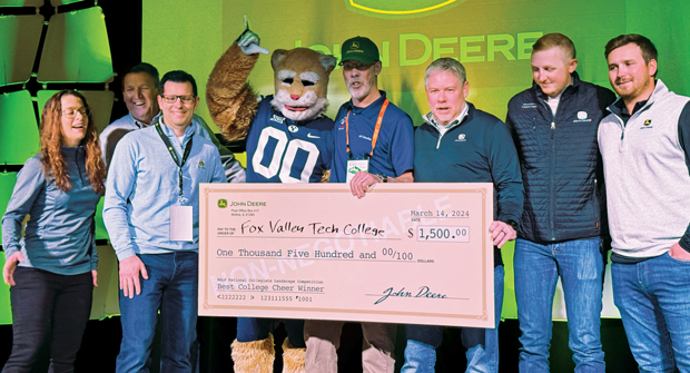 One-man band: Chuck Stangel, landscape and horticulture instructor at Fox Valley Technical College in Appleton, Wis., (center) took home $1,500 for his students for winning the cheer competition at the National Collegiate Landscape Competition (NCLC). (Photo: LM Staff)