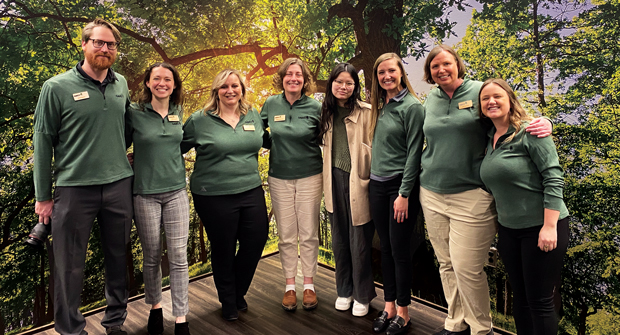 Welcome wagon: Members of Davey Tree’s Corporate Communications team helped guide guests through the company’s headquarters during its celebration of 45 years of being employee-owned. From left to right: Josh Reuck, Jill Golden, Whitney Randolph, Steph Donovan, Jillian Schrift, Helen Thompson, Jen Lennox and Megan Bowers. (Photo: LM Staff)