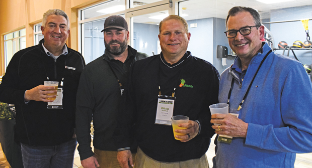 Brad Herrle (center) sales and operations manager at Lawn Rx in Latrobe, Pa., points to networking with industry colleagues as a highlight of his 2023 LM Growth Summit experience. (Photo: LM Staff)