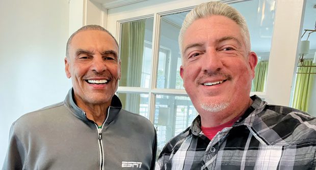 They play to win the game: Landscape Management’s Seth Jones (right) ran into former New York Jets and Kansas City Chiefs head coach Herm Edwards at a recent industry party. (Photo: LM Staff)
