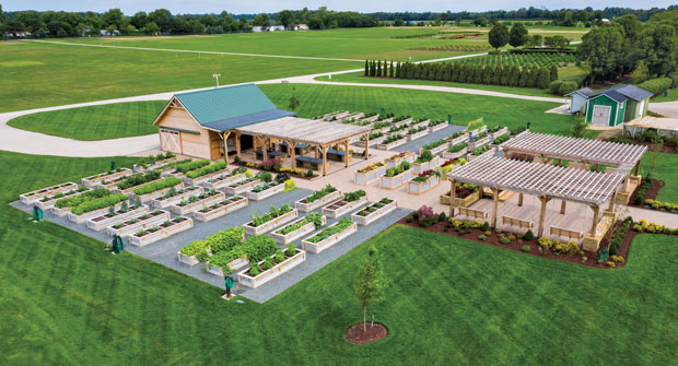 Hidden Creek Landscaping installed 60 raised garden beds to flank the central meeting space. The beds serve as growing spaces for vegetables and herbs for employees at the Scotts Miracle-Gro corporate campus. (Photo: Hidden Creek Landscaping)