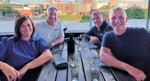 Raleigh sunset: (Left to right) McGavock Edwards, VP, E&V Strategic Communications, met the LM crew — Seth Jones, editorial director; Craig MacGregor, associate publisher and Bill Roddy, group publisher — for dinner and a nice view of the city. (Photo: LM Staff)