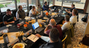 Before the fishing could begin, the group dove deep on two case studies and business law. (Photo: LM Staff)