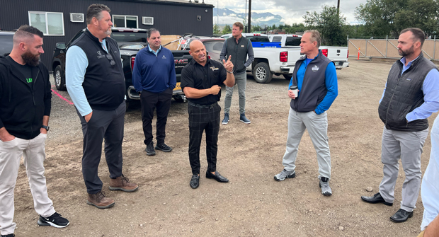 Todd Christianson (center), president and CEO of Titan LLC in Anchorage, Alaska, gives the Ace Peer Group a tour of his facility. (Photo: LM Staff)