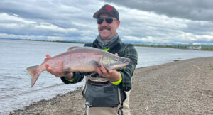 The catch of the week goes to Garret Hergert, GRO, for hauling in this beautiful sockeye. (Photo by Vince Torchia)