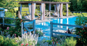 With the pool and many other large structures on-site, lots of weekly meetings and communication with the client was required to finalize the design. (Photo: A Blade of Grass and Michael J. Lee)