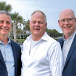 OPEI and LM are partnering to present education during the annual Equip Exposition for the third consecutive year. Here, Roddy (left) and Hollister (right) flank Kris Kiser, OPEI president and CEO. (Photo: LM Staff)
