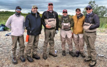 Chase Coates, Outback Landscapes; James Cali, McFarlin Stanford; Jones; David Amigo, G&G Landscape Solutions; Josh Amigo, G&G Landscape Solutions; and Vince Torchia, The Grow Group take a break from catching sockeye — nice job reaching the limit, guys. (Photo: Curtis Atkinson)