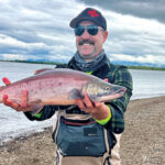 Catch of the week goes to Garret Hergert, GRO, for hauling in this beautiful sockeye. With a company name like GRO, did the rest of us stand a chance? (Photo: Vince Torchia)