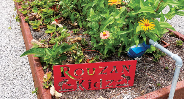EdgeForm’s planter boxes are designed with individual irrigation and provide opportunities for educating area residents. (Photo: EdgeForm Landscape Management)