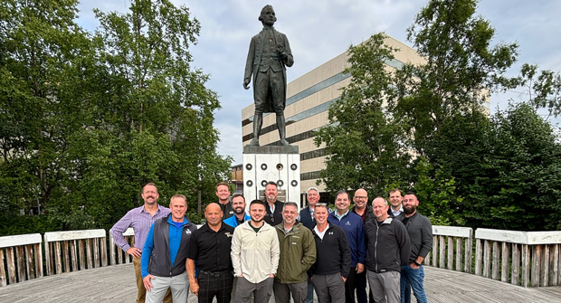 Watching Cook: Following dinner the group walked to take a photo with this statue of Captain James Cook. The Cook Inlet, which the statue faces, was named after Captain Cook in 1794. (Photo: Paul Myers)