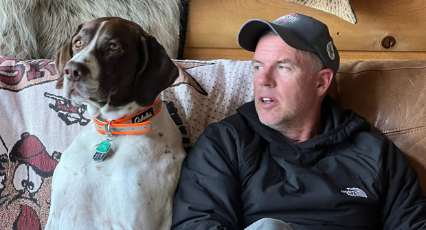 Man’s best friend: Cromley reunited with his friends in the ACE Peer Group in Alaska, and also made a new one while in Alaska: Manny, the Rapids Camp dog. (Photo: LM Staff)