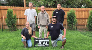 Jason Teal (center) was able to expand the Teal Lawncare team to five staff members in 2024. (Photo: Jason Teal)