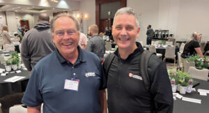 A couple of industry ambassadors Longtime friend of LM Chris Senske, acquisitions ambassador, Senske Services, and Roddy catch up at the Summer Growth Summit. (Photo: LM staff)